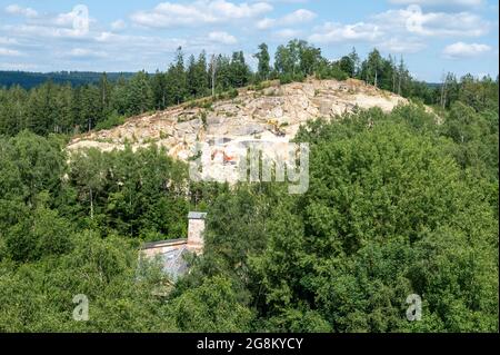 21 July 2021, Bavaria, Flossenbürg: The quarry of the Flossenbürg concentration camp. The Free State firmly rejects any further use of the quarry beyond the current lease period. Photo: Armin Weigel/dpa Stock Photo