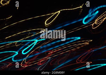 Abstract background of amorphous light trails at night with long exposure techic Stock Photo