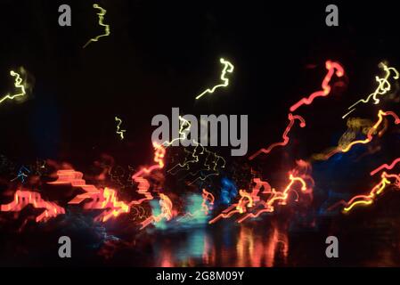 Abstract background of amorphous light trails at night with long exposure techic Stock Photo