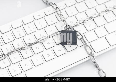 Computer Security concept. Chain and padlock on keyboard. Cyber security concept Stock Photo
