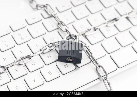 Computer Security concept. Chain and padlock on keyboard. Cyber security concept Stock Photo
