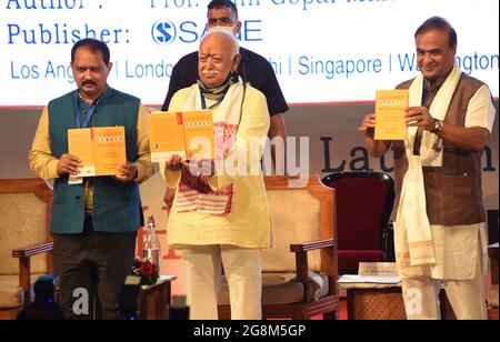 Guwahati, Guwahati, India. 21st July, 2021. Mohan Bhagwat chief of Rashtriya Swayamseval Sangh (RSS) along with Himanta Biswa Sarma chief minister of Assam, Nani Gopal Mahanta author of the book release the book during the launch of the Book Citizenship Debate over NRC &CAA written by Nani Gopal Mahanta at Srimanta Sankardeva International auditorium, Kalakshetra also seen in the picture Himanta BIswa Sarma chief minister of Assam in Guwahati Assam India on Wednesday 21st July 2021. (Credit Image: © Dasarath Deka/ZUMA Press Wire) Stock Photo