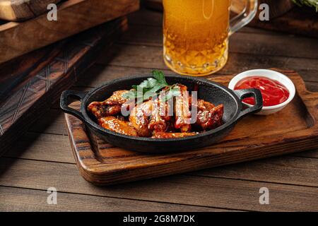 Plate of fried wings in teriyaki sauce Stock Photo