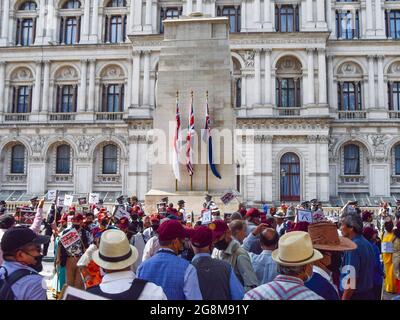 London, UK. 21st July, 2021. Demonstrators gather next to the Cenotaph war memorial during the protest. Protesters gathered in Westminster demanding the British government address grievances including the unequal pensions which, the protesters claim, are given to Gurkha army veterans compared to their British counterparts. Credit: SOPA Images Limited/Alamy Live News Stock Photo