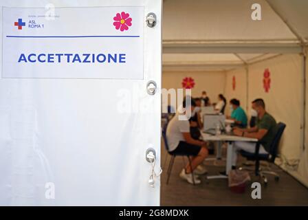 Rome. 21st July, 2021. Photo taken on July 21, 2021 shows a registration area of a vaccination center in Rome, Italy. Over half of the population targeted by Italy's coronavirus vaccination campaign has already been fully immunized, the country's health authorities said here on Monday. Credit: Jin Mamengni/Xinhua/Alamy Live News Stock Photo