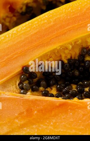 papaya isolate on white. delicious ripe papaya cut in half close-up Stock Photo