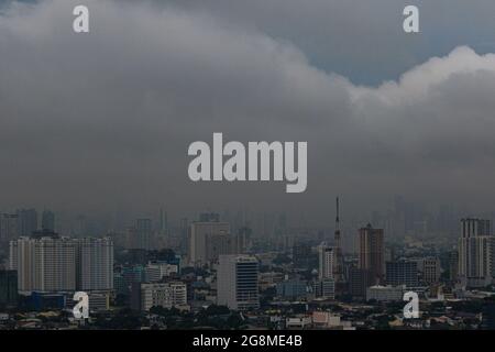 Quezon City, Philippines. 21st July 2021. Buildings and houses in Quezon City were drenched by the southwest monsoon enhanced by Typhoon Fabian. Stock Photo