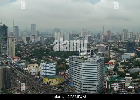 Quezon City, Philippines. 21st July 2021. Buildings and houses in Quezon City were drenched by the southwest monsoon enhanced by Typhoon Fabian. Stock Photo