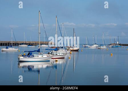 Small sailing boats moored in Granton Harbour in the Firth of Forth, Edinburgh, Scotland, UK. Stock Photo