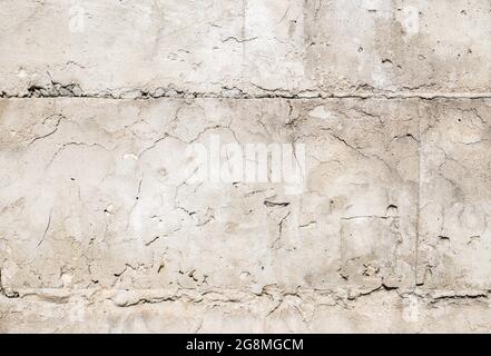 White concrete background. Old dirty concrete wall texture. Cracked cement texture. Stone wall background. Stock Photo