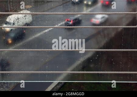 Steel cable to protect the glass fence on the pedestrian bridge in Kyiv, Ukraine Stock Photo