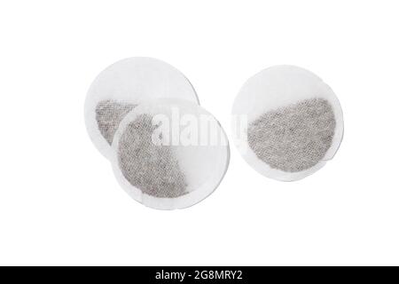 Top view of three round tea bags isolated on white background Stock Photo