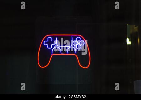 Neon Sign Joystick Game computer club cafe showcase window  Stock Photo