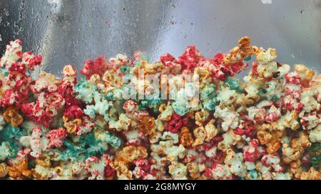 colored popcorn on white background Stock Photo
