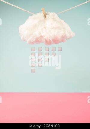Sugar cubes raining from a cloud hanging and drying on a rope. On trendy pastel blue and pink background. Minimal abstract unhealthy eating concept. Stock Photo