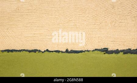 abstract paper landscape in green and beige pastel tones created from sheets of handmade textured paper Stock Photo