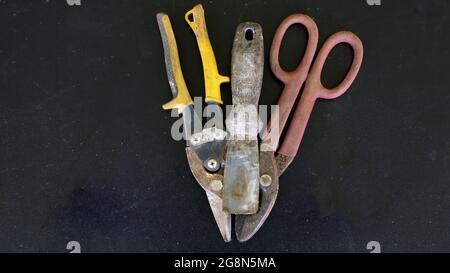 A Putty Knife and Aviation along with Duckbill Tin Snips Stock Photo
