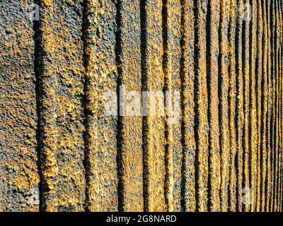 rusty brown colored abandoned weathered corrugated metal. closeup view. Stock Photo
