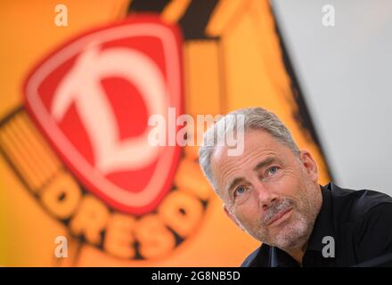Dresden, Germany. 21st July, 2021. Football: 2nd Bundesliga, SG Dynamo Dresden members' meeting, at Rudolf Harbig Stadium. Dynamo's commercial director Jürgen Wehlend sits on the podium. Credit: Robert Michael/dpa-Zentralbild/dpa - IMPORTANT NOTE: In accordance with the regulations of the DFL Deutsche Fußball Liga and/or the DFB Deutscher Fußball-Bund, it is prohibited to use or have used photographs taken in the stadium and/or of the match in the form of sequence pictures and/or video-like photo series./dpa/Alamy Live News Stock Photo