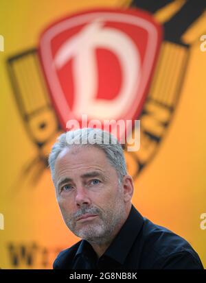 Dresden, Germany. 21st July, 2021. Football: 2nd Bundesliga, SG Dynamo Dresden members' meeting, at Rudolf Harbig Stadium. Dynamo's commercial director Jürgen Wehlend sits on the podium. Credit: Robert Michael/dpa-Zentralbild/dpa - IMPORTANT NOTE: In accordance with the regulations of the DFL Deutsche Fußball Liga and/or the DFB Deutscher Fußball-Bund, it is prohibited to use or have used photographs taken in the stadium and/or of the match in the form of sequence pictures and/or video-like photo series./dpa/Alamy Live News Stock Photo