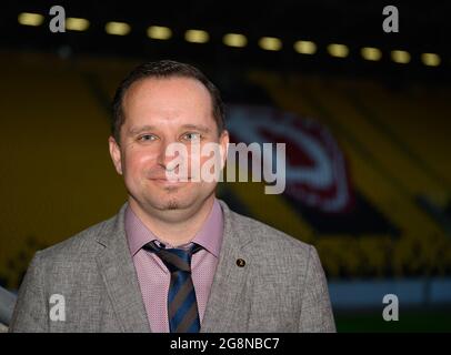 Dresden, Germany. 21st July, 2021. Football: 2nd Bundesliga, SG Dynamo Dresden members' meeting, at Rudolf Harbig Stadium. Dynamo's vice president Ronny Rehn stands by his election in the stands. Credit: Robert Michael/dpa-Zentralbild/dpa - IMPORTANT NOTE: In accordance with the regulations of the DFL Deutsche Fußball Liga and/or the DFB Deutscher Fußball-Bund, it is prohibited to use or have used photographs taken in the stadium and/or of the match in the form of sequence pictures and/or video-like photo series./dpa/Alamy Live News Stock Photo