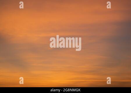 Twilight sky. Natural sunset or sunrise sky in orange, nature background. Stock Photo