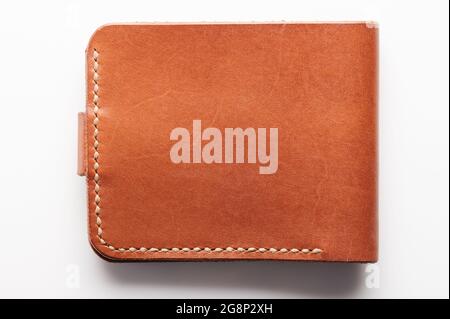 Slim brown color leather wallet back color isolated Stock Photo