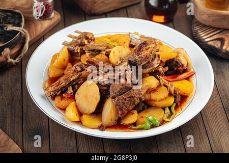 Uzbek dish kazan kabob with lamb and potatoes Stock Photo