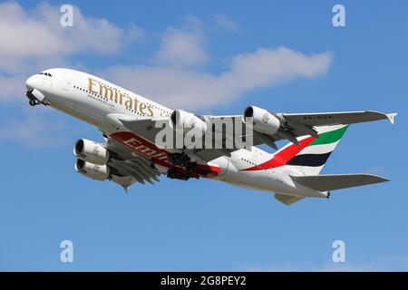 An Airbus A380 flying for Emirates departs from London Heathrow Airport Stock Photo