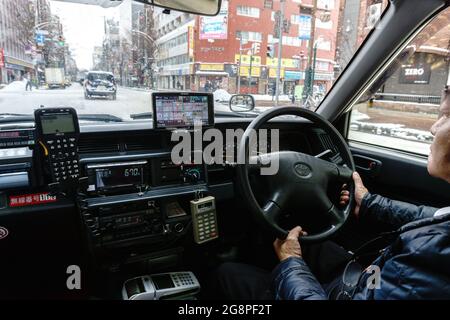 Sapporo,Japan-December 26,2017: Image of interior Japanese taxi complete with GPS and Distance meter in Sapporo City Hokkaido Japan During winter seas Stock Photo