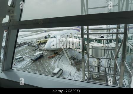 New Chitose, Hokkaido, Japan-December 28, 2017 : Image view from aircraft Thai Airways Boeing 777-300ER in New Chitose Airport are ready to take off Stock Photo