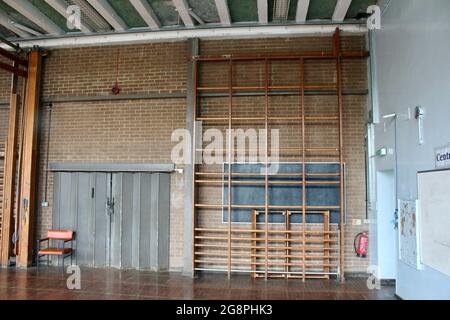 an empty classic wooden style gymnasium in an english secondary school in london england UK Stock Photo