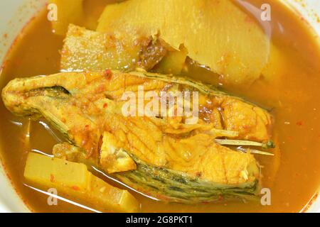 boiled red mango fish with pickled bamboo shoot in spicy and sour soup ...