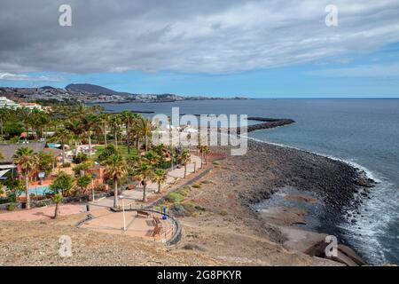 Elevated panoramic views of the entire coast, hotels, beaches, promenade walk and bay from the brilliant lookout known as Mirador Palomas, Tenerife Stock Photo