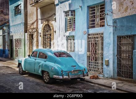 Havana, Cuba, July 2019, view of a light blue Chevrolet parked in a street in the old part of the capital Stock Photo