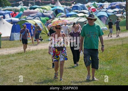 Festivalgoers at the Latitude festival in Henham Park, Southwold, Suffolk. Picture date: Thursday July 22, 2021. Stock Photo