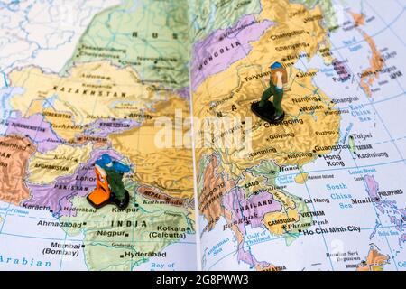 Delivery Models over the world map book. Stock Photo