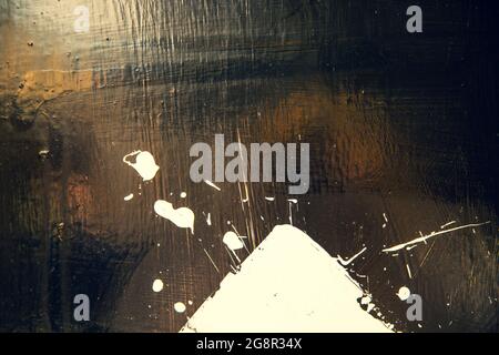 Splashes of paint on a black background Stock Photo
