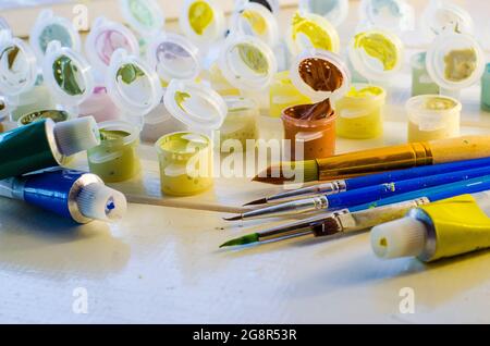 set of colored acrylic paints and brushes for drawing Stock Photo