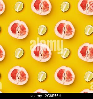 Creative collage, modern artwork. Juicy pieces of lime and grapefruit arranged over yellow background. Stock Photo