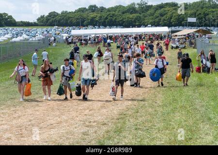 Standon, Hertfordshire, UK. 22nd July, 2021. People arrive at Standon Calling Music festival due to take place this weekend. It is one of the first festivals to be held after the relaxation of Covid restrictions in the UK and attendees had to take a verified and video recorded lateral flow test as a condition of entry. Credit: Julian Eales/Alamy Live News Stock Photo