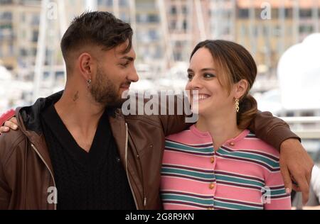 July 14, 2021, CANNES, France: CANNES, FRANCE - JULY 14: Noemie Merlant and Gimi-Nicolae Covaci attend the ''Mi Iubita Mon Amour'' photocall during the 74th annual Cannes Film Festival on July 14, 2021 in Cannes, France. (Credit Image: © Frederick InjimbertZUMA Press Wire) Stock Photo