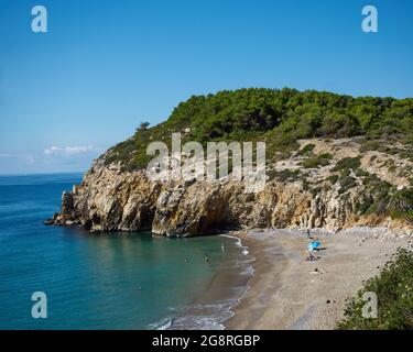 Fantastic view of the famous beach called 'Home Mort Beach' of Sitges, Spain in a sunny spring day Stock Photo