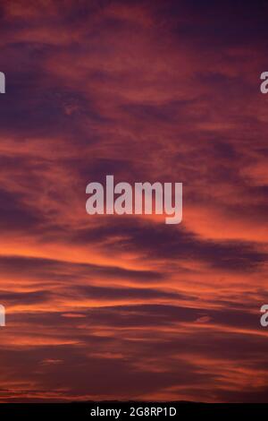 sunset skies with warm colors in summer times Stock Photo