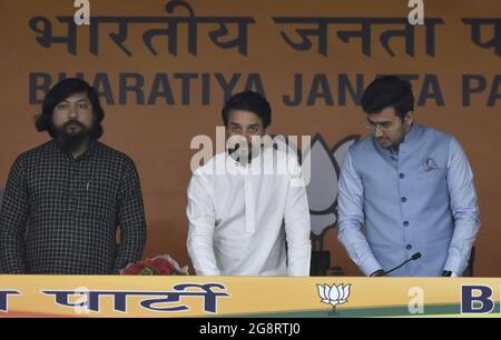 NEW DELHI, INDIA - JULY 22: Minister of Sports, Youth Affairs and Minister of Information and Broadcasting Anurag Thakur, Minister of state for Sports Nisith Pramanik & BJYM President and Lok Sabha MP Tejasvi Surya and others during a press conference to cheer the Indian athletes & players participating in Tokyo Olympics, at BJP HQ on July 22, 2021 in New Delhi, India. Union minister Anurag Thakur cheered Indian athletes ahead of Tokyo Olympic games 2020 and started a new initiative #humaravictorypunch to boost spirits of athletes. BJYM too launched “Be Like Olympian” campaign aimed at inspiri Stock Photo