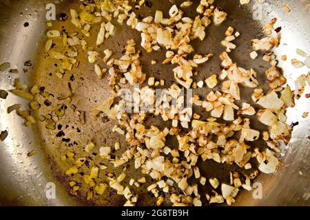 Roasted onion in pan Stock Photo