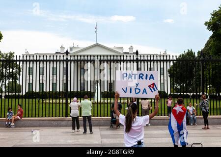 Washington, DC, USA, 22 July 2021.  Pictured: A group of demonstrators hold signs and Cuban flags at a protest against Miguel Diaz and the Cuban regime in front of the White House.  Credit: Allison Bailey / Alamy Live News Stock Photo