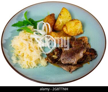 Appetizing fried rabbit liver with vegetables Stock Photo