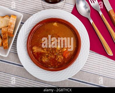 Stewed lentils with sausages, spanish Riojan lentils Stock Photo