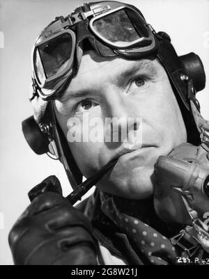 KENNETH MORE Portrait as R.A.F. Group Captain Douglas Bader in REACH FOR THE SKY 1956 director / screenplay LEWIS GILBERT from book by Paul Brickhill music John Addison Angel Productions / The Rank Organisation Stock Photo